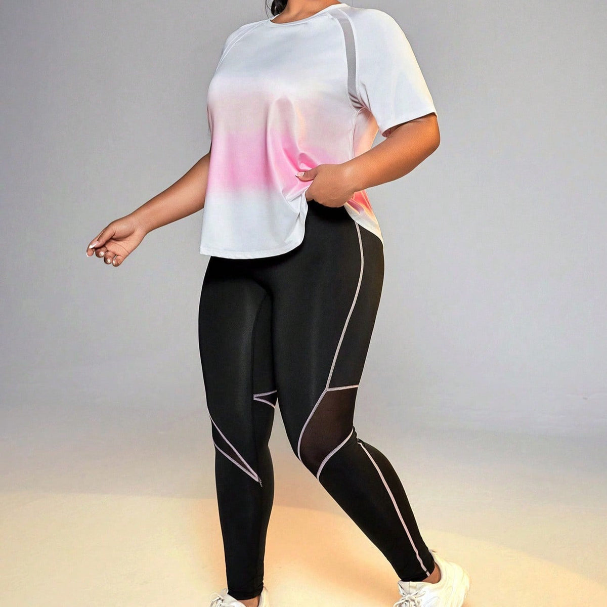 Conjunto feminino esportivo camisa gola redonda e legging Ziggy. Plus Size